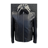 Black textured jacket with fur hood on a textured