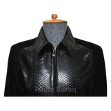 Black leather jacket with snake skin pattern on a mannequin