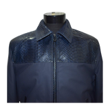 Navy blue jacket with snake skin pattern on a mannequin
