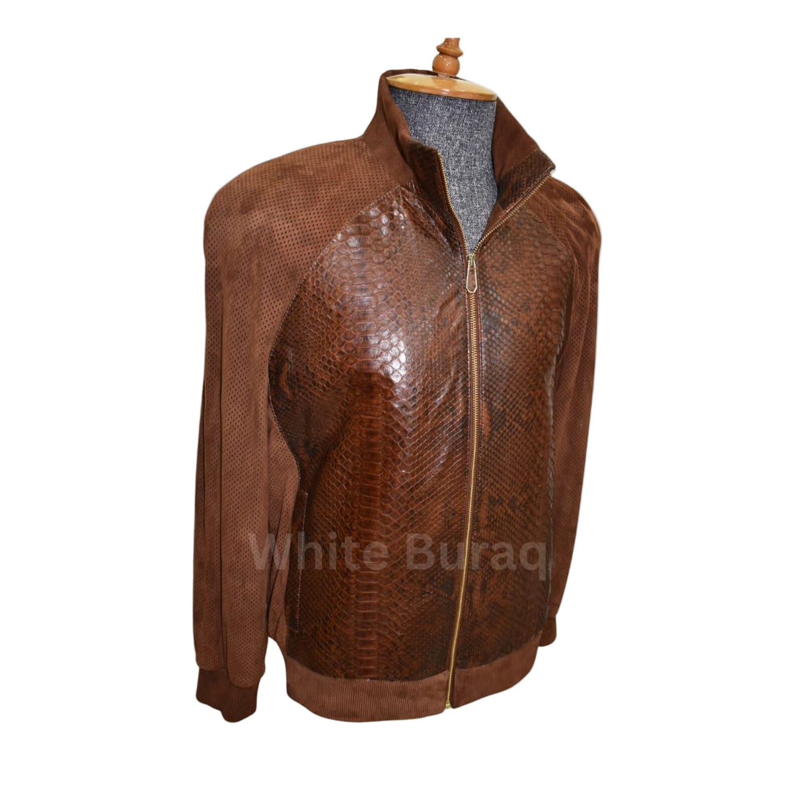 Brown leather jacket with snake skin pattern on a mannequin