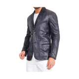 Man wearing a patterned blazer over a white shirt