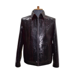 Black leather jacket with snake skin pattern on a mannequin