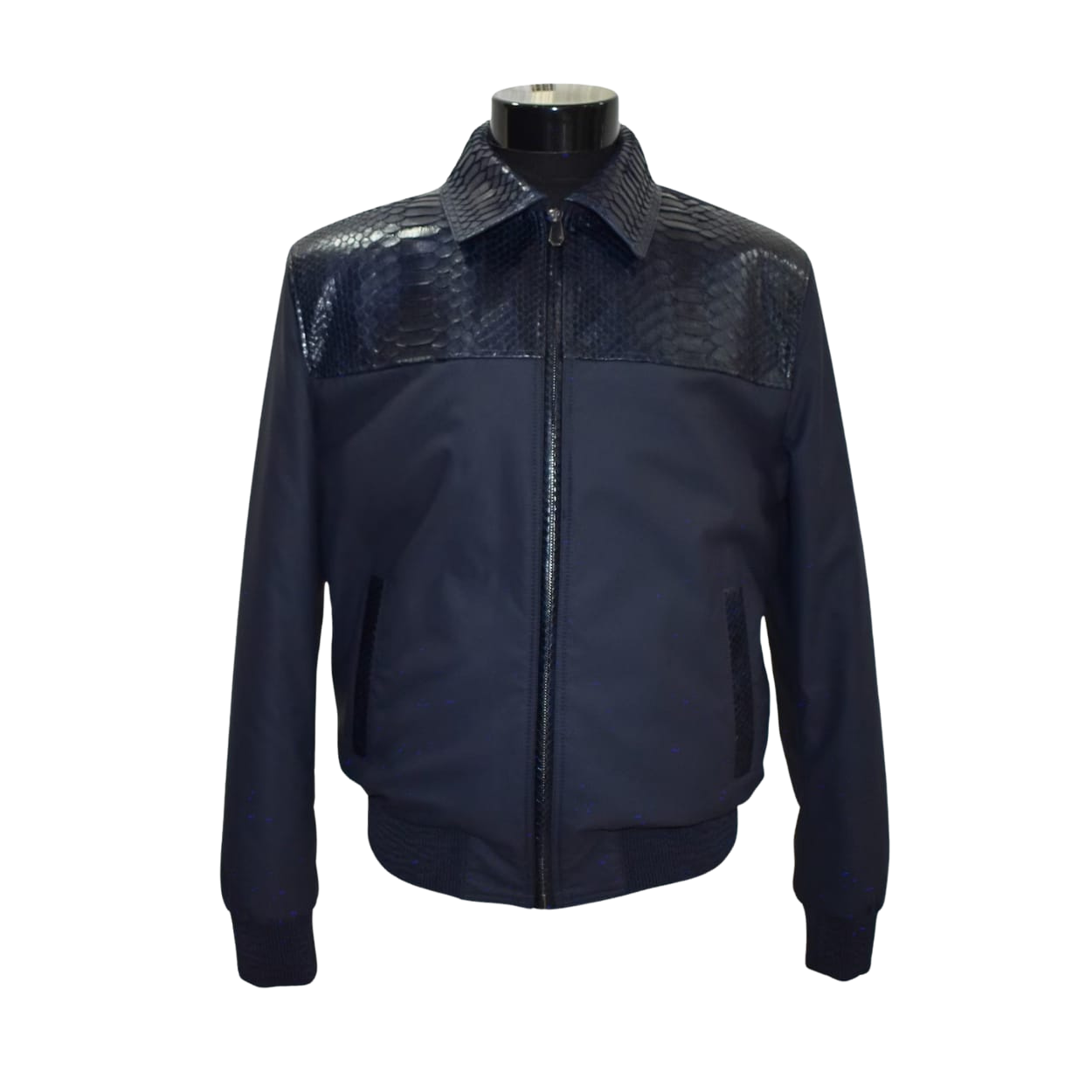 Black jacket with snake skin pattern on shoulders on a mannequin