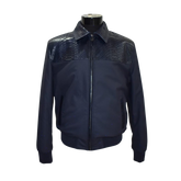 Black jacket with snake skin pattern on shoulders on a mannequin