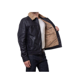 Black leather jacket with beige shearling lining worn by a person