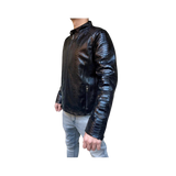 Black leather jacket with snake skin pattern worn by a person