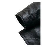 Black leather fabric with a slight texture