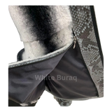 Close-up of a snake skin jacket with fur lining,