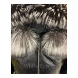 Close-up of a fur-lined hood with a zipper on a textured fabric background