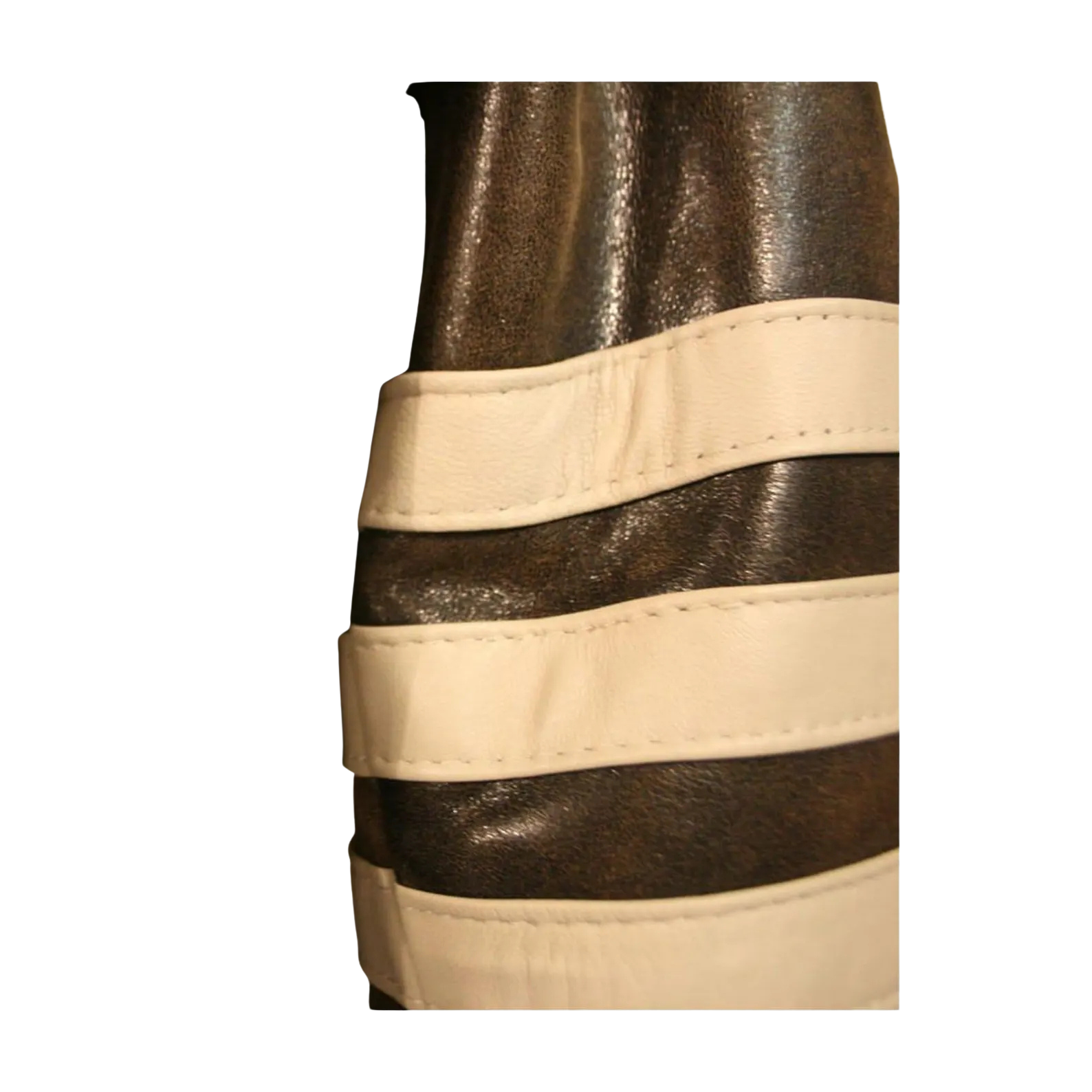 Close-up of a belt with gold and beige straps