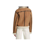 Brown jacket with black accents worn by a person