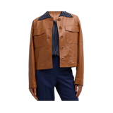 Brown leather jacket with striped shirt and navy pants