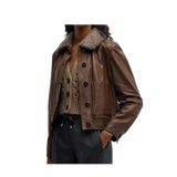 Black leather jacket with white fur lining