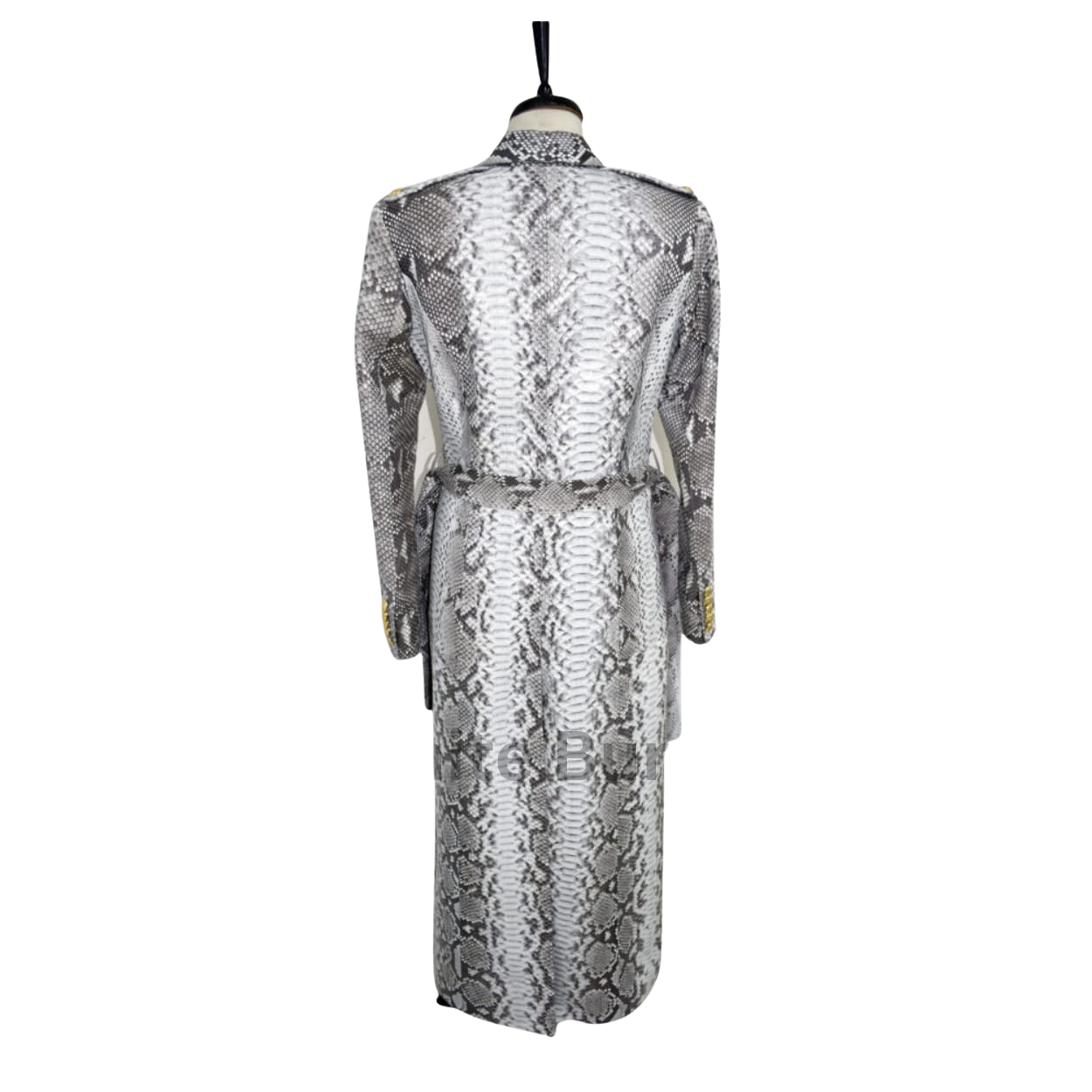 Snakeskin-patterned coat on a mannequin