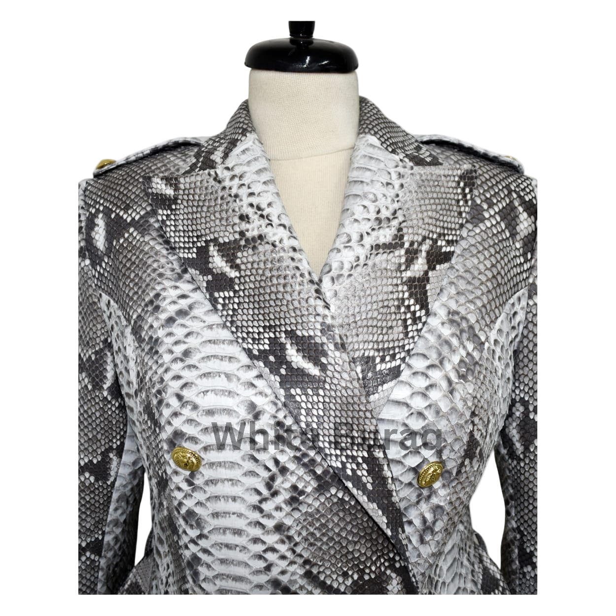 Snakeskin-patterned jacket on a mannequin