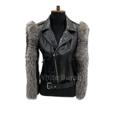 Black leather jacket with fur sleeves on a mannequin