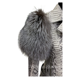 Close-up of a fur-lined hood with a textured pattern