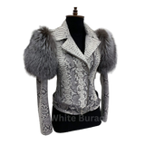 White lace jacket with fur shoulders on a mannequin
