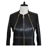 Black leather jacket with gold zippers on a mannequin
