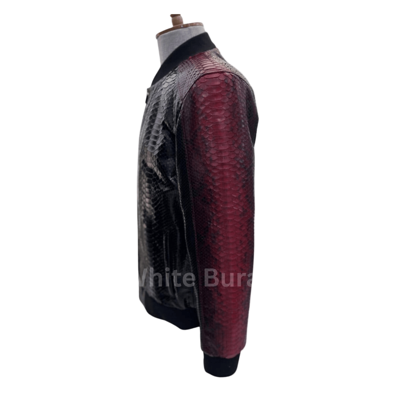 Mannequin wearing a red and black leather jacket with snake skin pattern