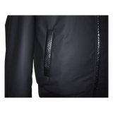 Close-up of a black jacket with textured patch 