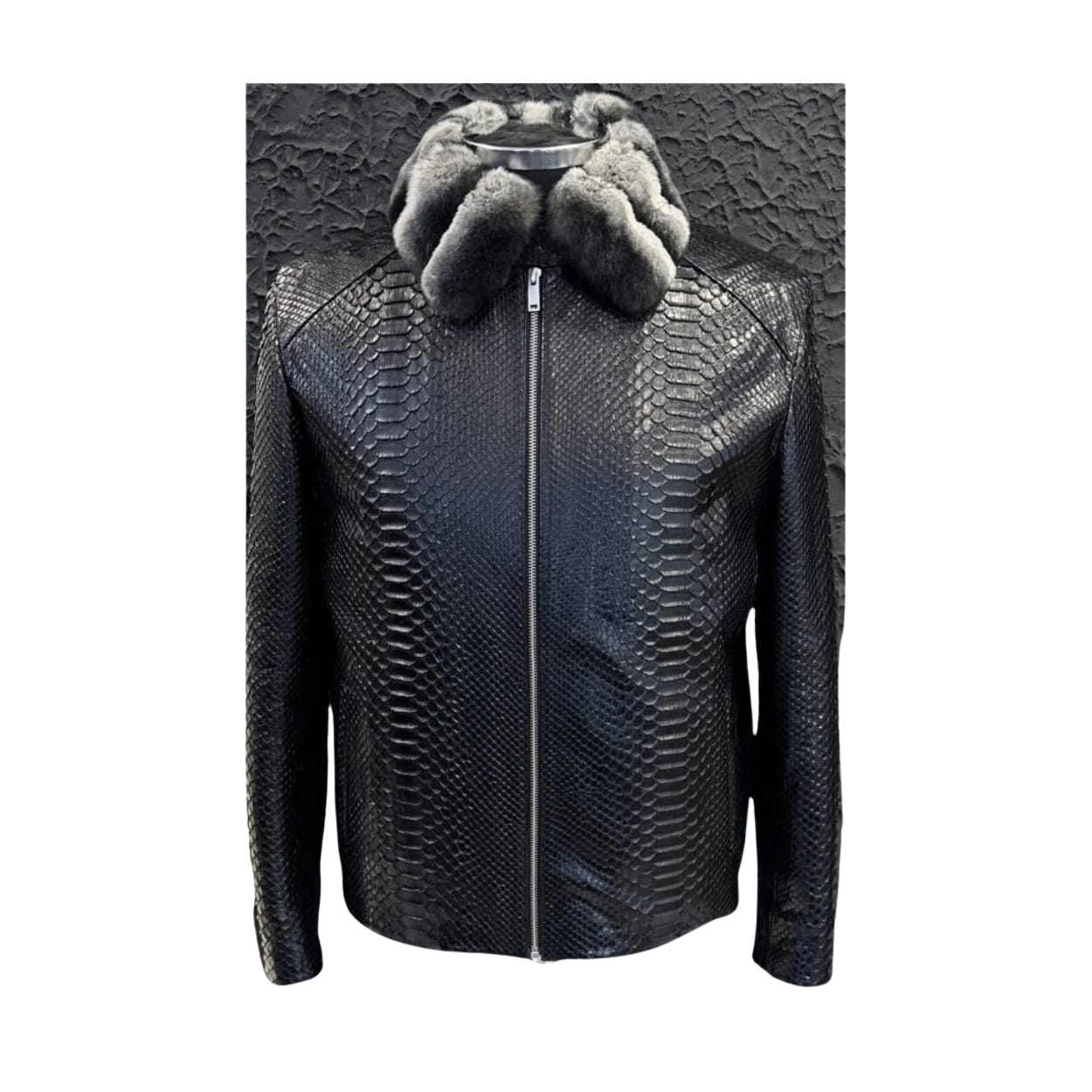 Black textured jacket with fur hood on a textured 