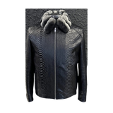 Black textured jacket with fur hood on a textured 