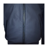Close-up of a navy blue jacket with a zipper 