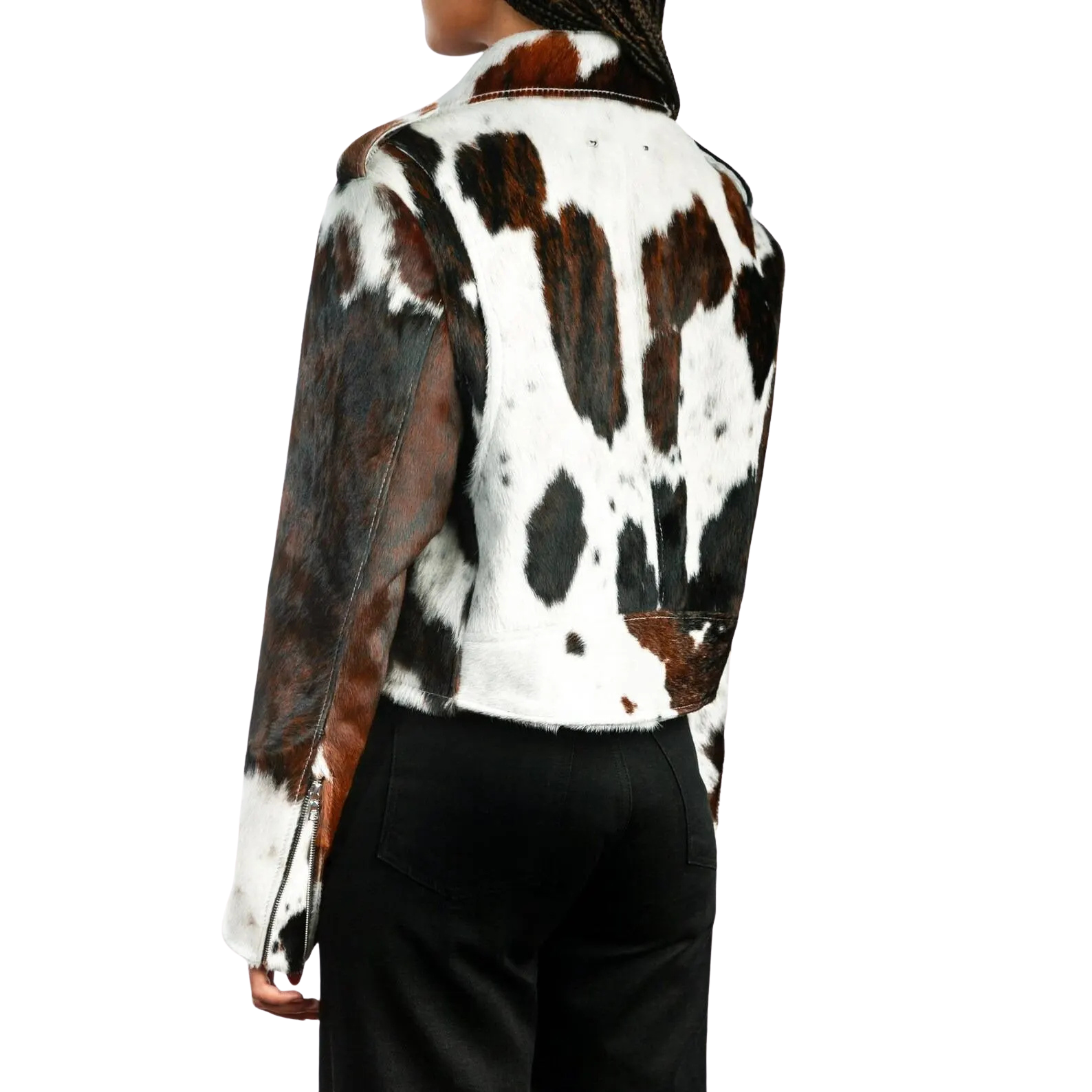 Person wearing a cow print jacket