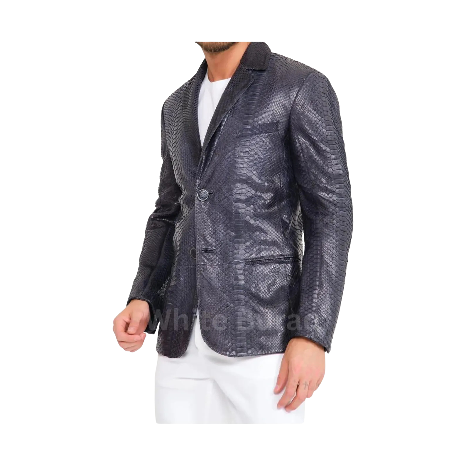 Man wearing a patterned blazer over a white shirt 