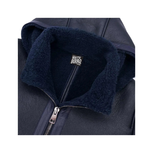 Navy blue jacket with a visible brand logo on the collar against 