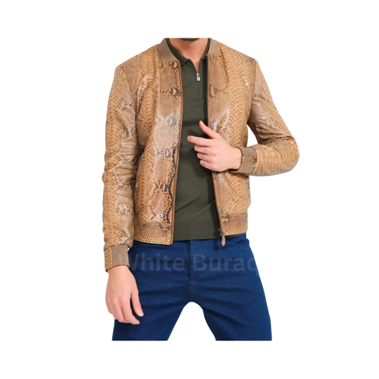 Man wearing a patterned jacket over a green shirt and blue pants 