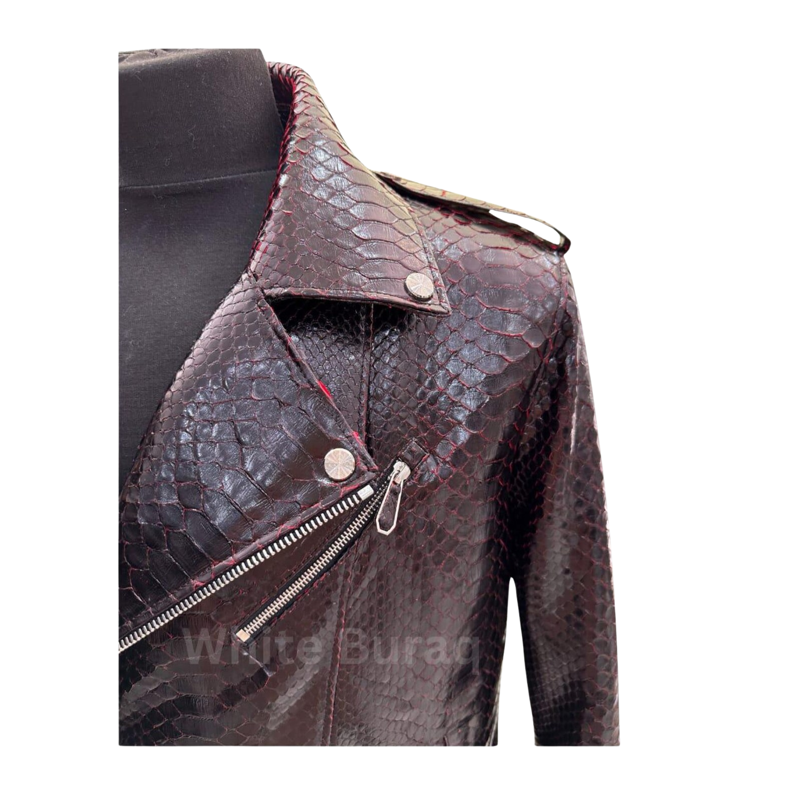 Close-up of a textured leather jacket with a zipper 