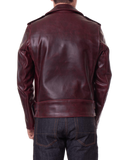 Back view of a person wearing a dark red leather jacket 