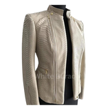 Beige textured jacket on a mannequin 