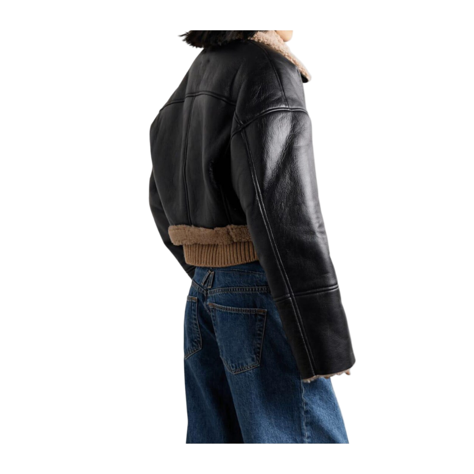 Black leather jacket with fur lining worn by a person 