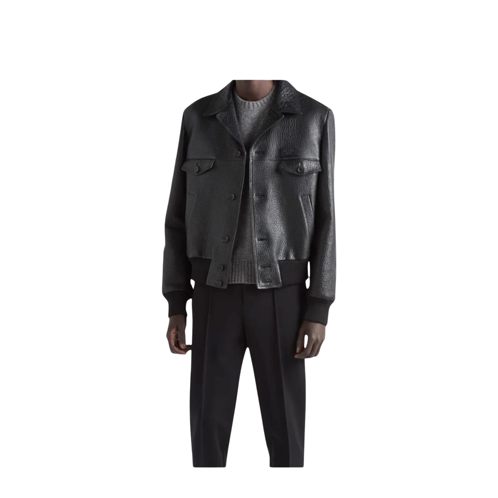 Man wearing a dark leather jacket and black pants 