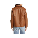 Brown leather jacket worn by a person 