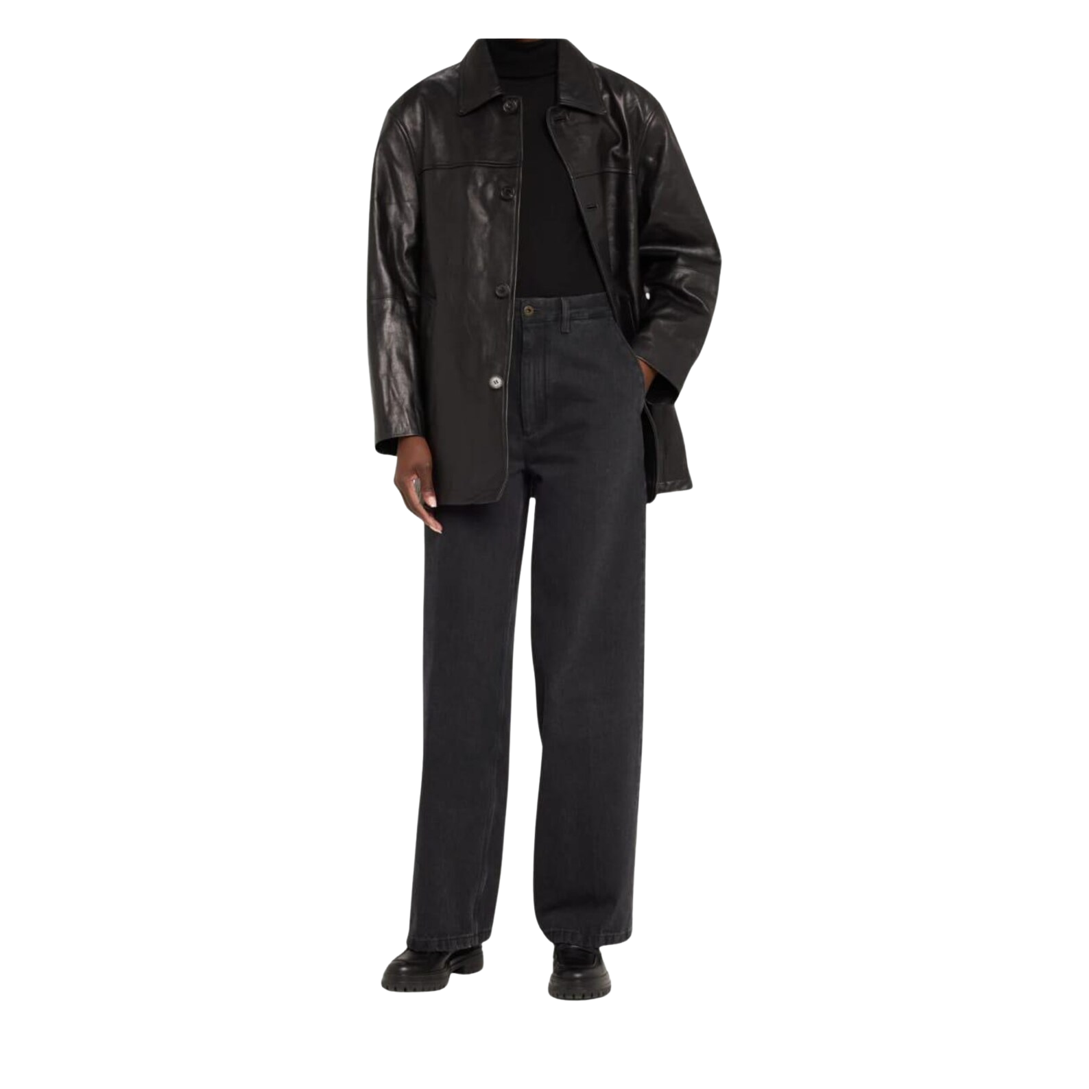 Person wearing a black leather coat over a black outfit 