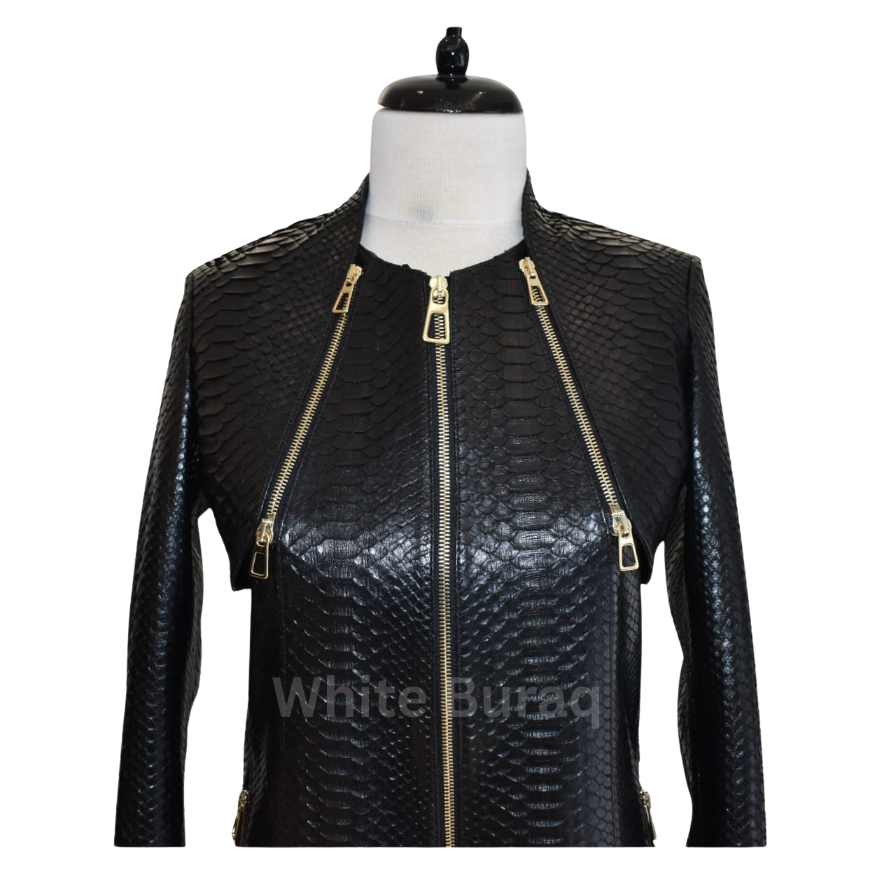 Black leather jacket with gold zippers on a mannequin 