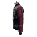 Mannequin wearing a red and black leather jacket with snake skin pattern 