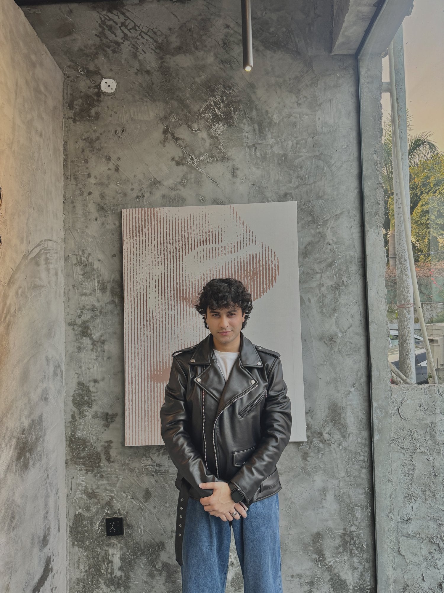 Men's Black Leather Belted Biker Jacket – worn by model, front view