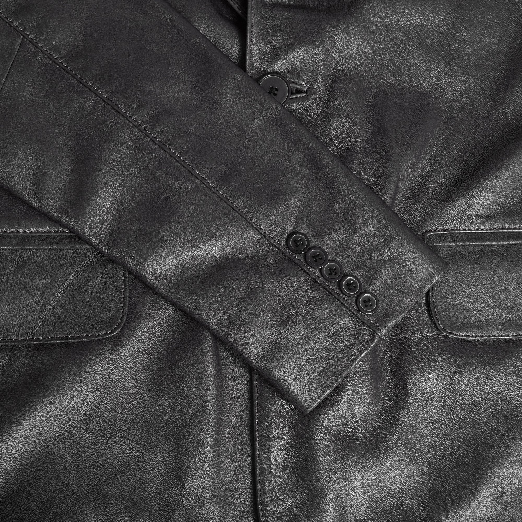 Men's Leather Two-Button Blazer in Black – four-button cuff and flap pocket detail