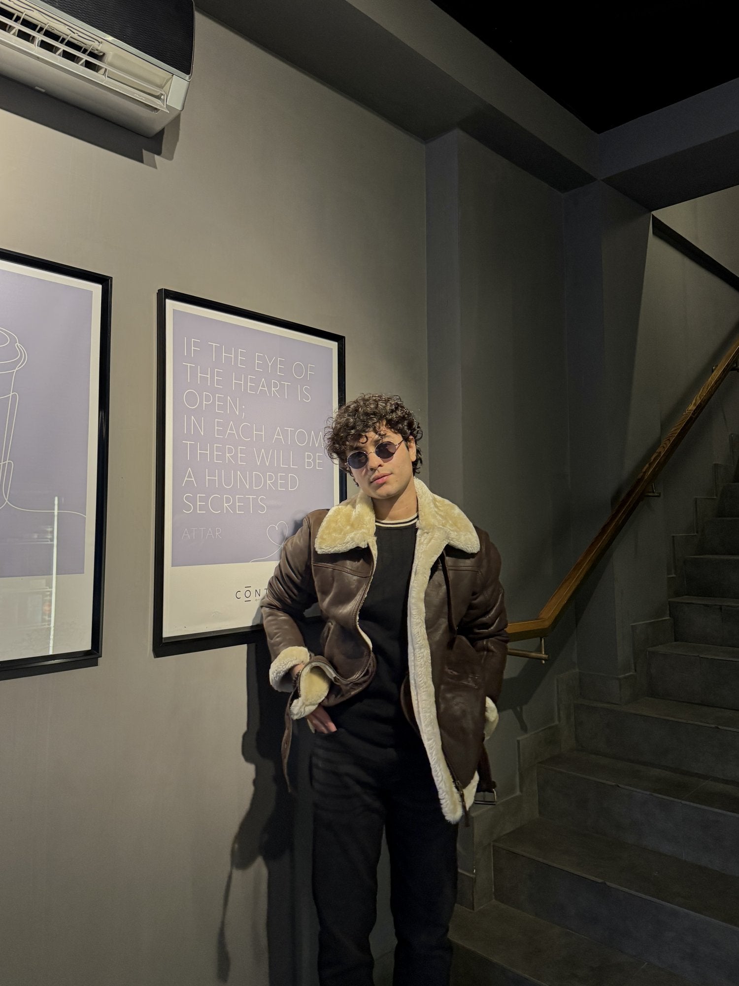 Men's B-3 Leather Aviator Jacket with Faux Shearling in Dark Brown – worn by model, three-quarter view