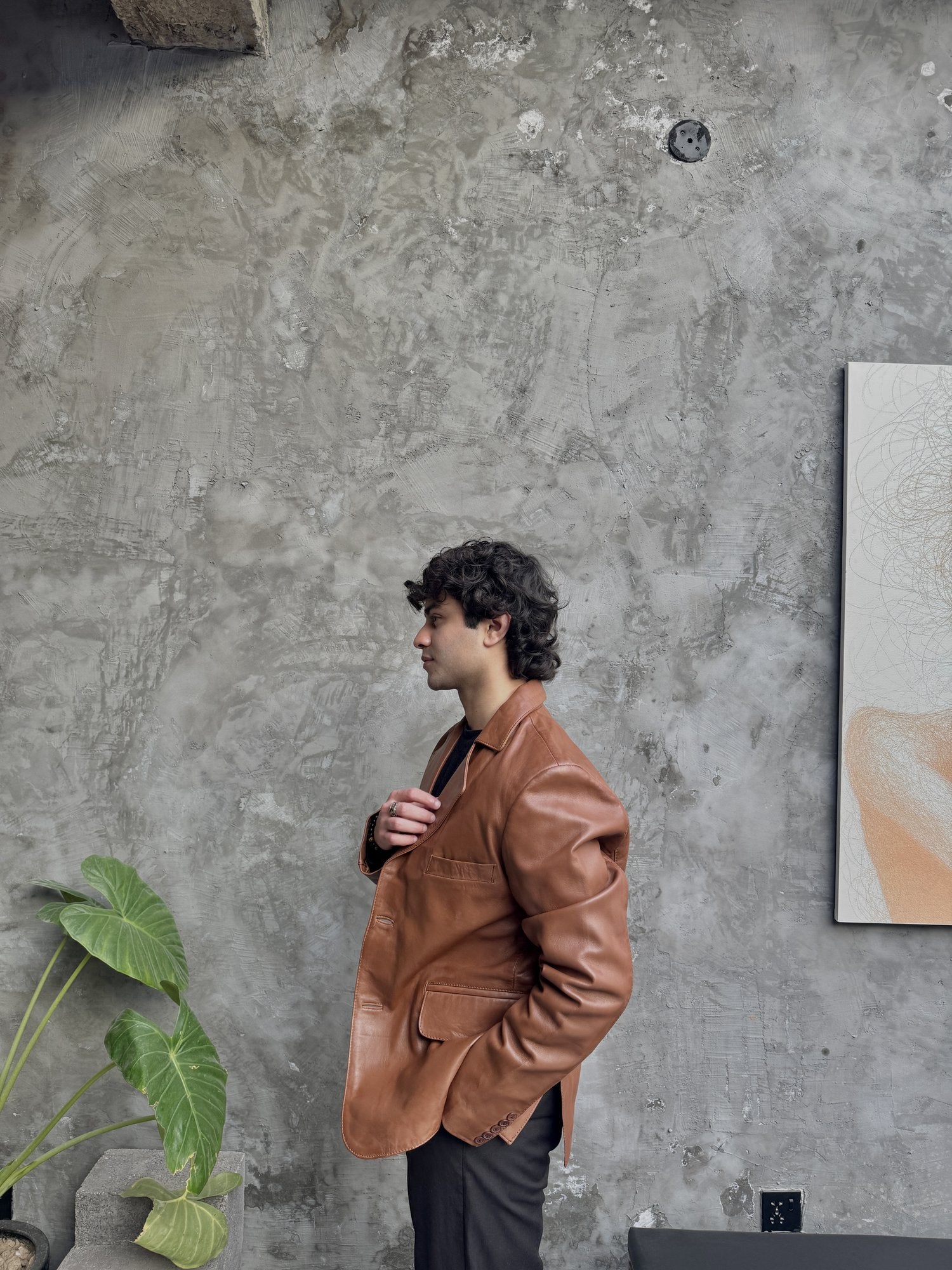 Men's Leather Two-Button Blazer in Tan – side view on model