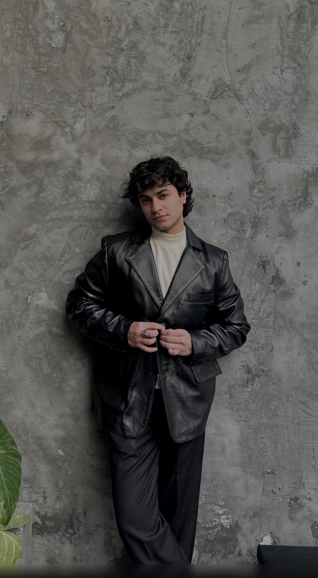 Man wearing a black leather blazer
